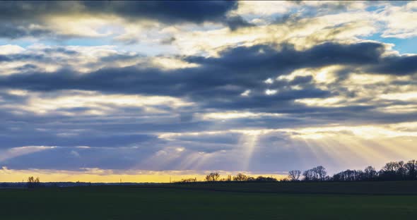 Sunbeams Moving Across the Sky