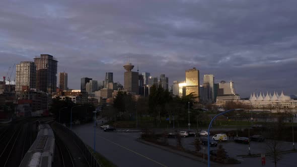 Vehicles Pass By The Highway From Early Morning Until Sunrise In Gastown, Vancouver, Canada. timelap