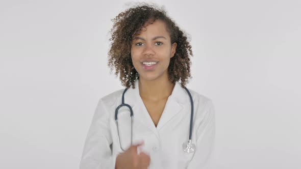 African Female Doctor Showing Thumbs Up Sign on White Background