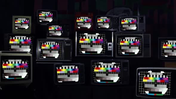 Retro TVs Turning On Test Pattern with Static and Electromagnetic interference.