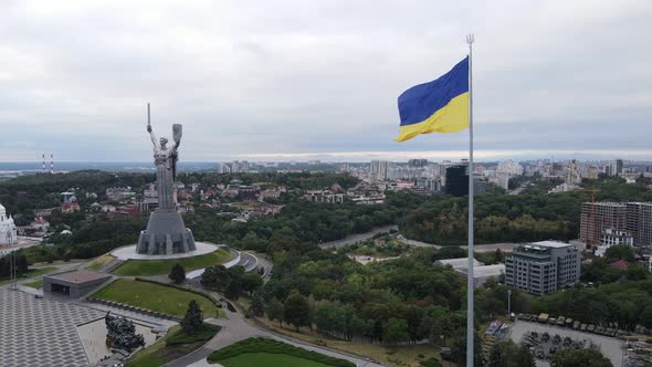 Kyiv - National Flag of Ukraine By Day. Aerial View. Kiev. Slow Motion