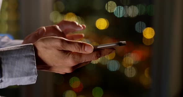 Woman Surfs Internet on Phone at Blurry City Slow Motion