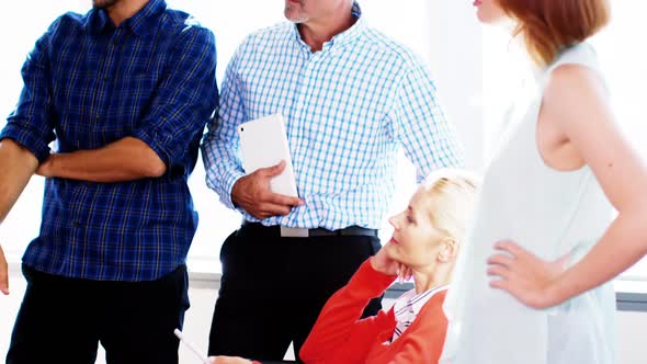 Team of business executives having a discussion in meeting