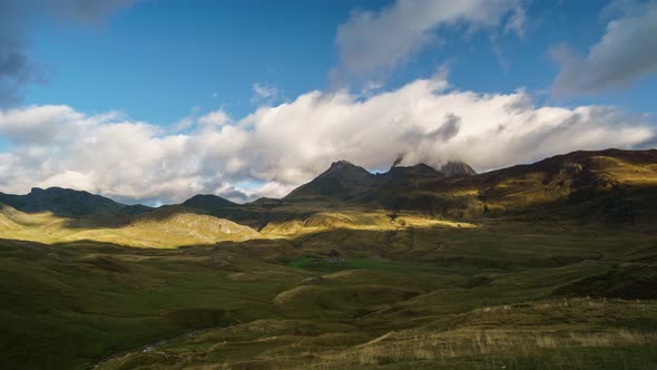 timelapse of moving clouds in the mountains at sunrise in Pyrenees national park, Frane