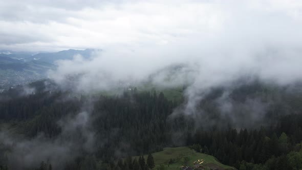 Fog in the Mountains. Slow Motion. Carpathians. Ukraine. Aerial.