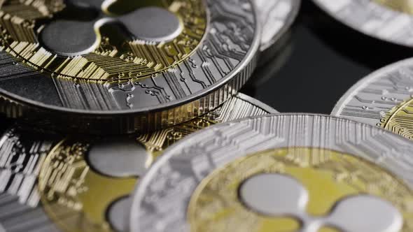 Rotating shot of Bitcoins (digital cryptocurrency) - BITCOIN RIPPLE