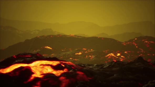 Volcanic Eruption with Fresh Hot Lava Flames and Gases Going Out From the Crater