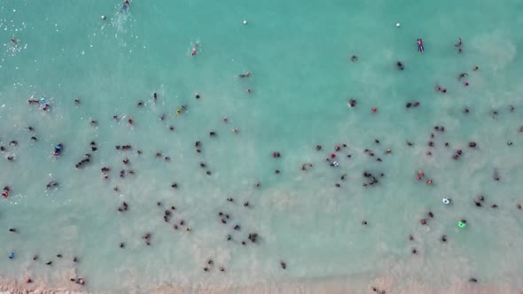 the Island of Mauritius, Bathing Locals in the Indian Ocean