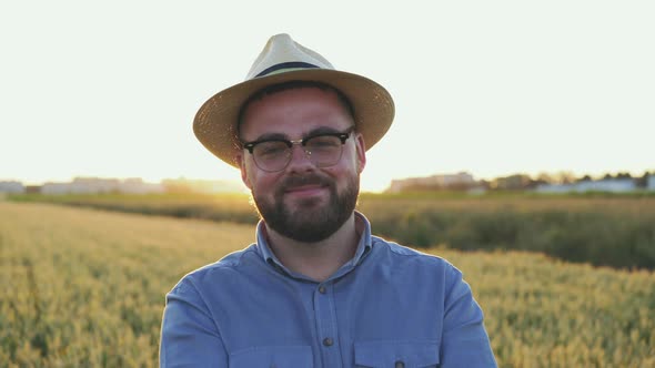 Portrait of Successful Farmer with Smile on Face Looking at Camera