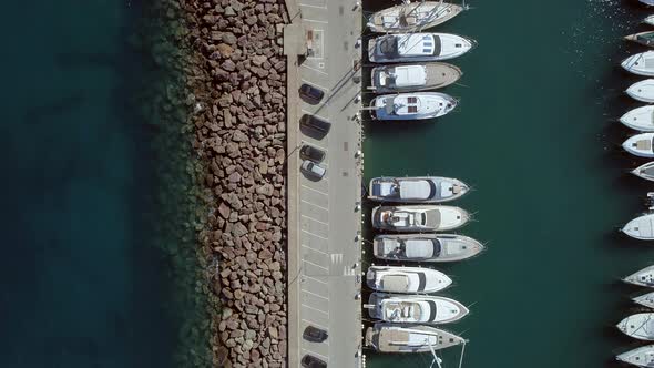 Bird's Eye View of a Small Marina with Ships and Boats