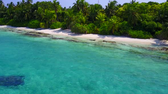 Daytime panorama of lagoon beach trip by sea with sand background near surf