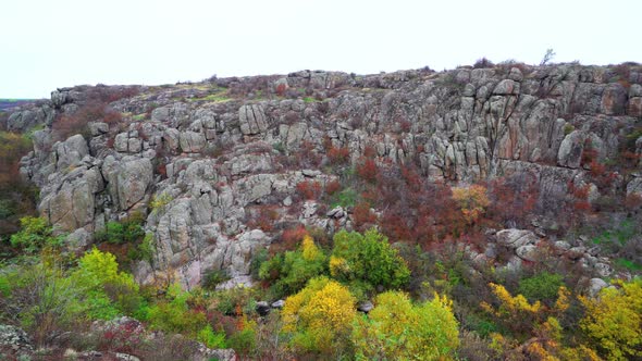 Aktovsky Canyon in Ukraine Surrounded By Autumn Trees and Large Stone Boulders