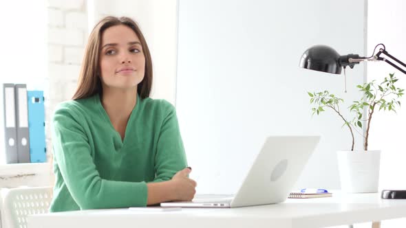 Creative Woman Shaking Head to Gesture Yes, Accepting Deal