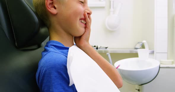 Unhappy young patient having a toothache