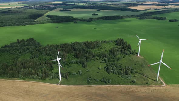 Windmills in Summer in a Green Field