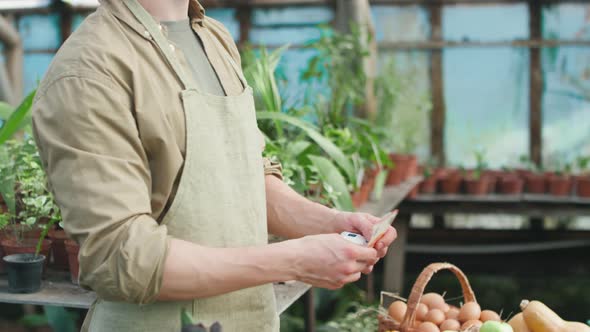 Happy Man Selling Fresh Fruit and Vegetables