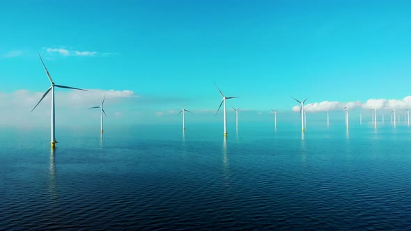 Windmill Park in the Ocean Drone Aerial View of Windmill Turbines Generating Green Energy Electric