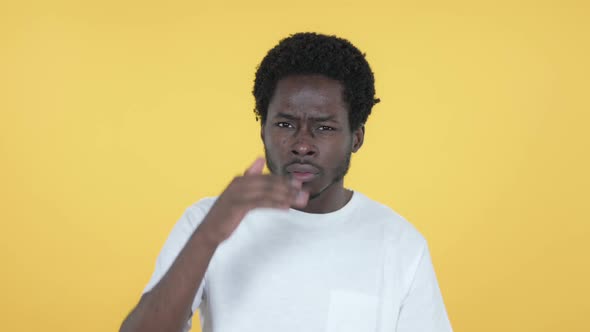 African Man Searching New Chance Yellow Background