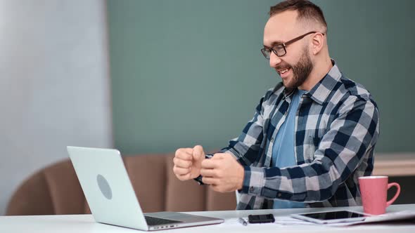 Business Male Celebrate Victory or Successful Deal at Workplace