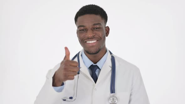 African Doctor Showing Thumbs Up Sign on White Background