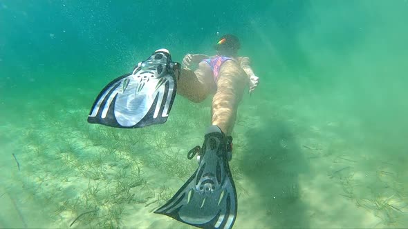 Girl Diving In Sea