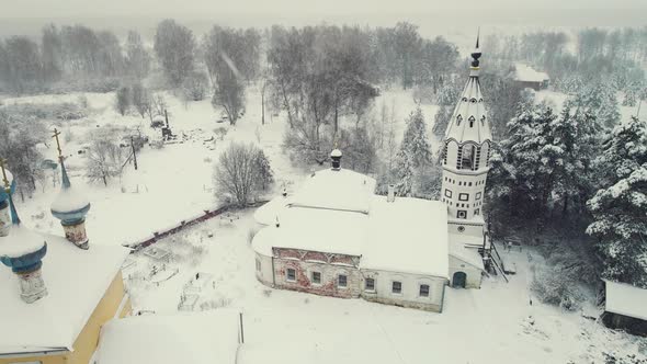 Fairy Snowy Rural Landscape and Church Winter Aerial View