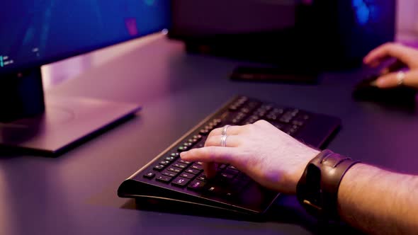 Close Up Gamer Keeping His Hands on Keyboard