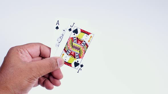 Hand Holds Black Jack Spades