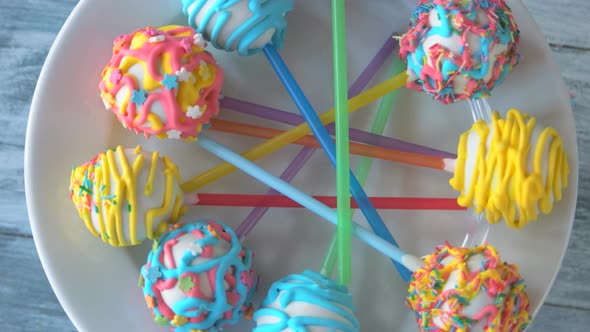 Fresh and Tasty Cake Pops on Plate