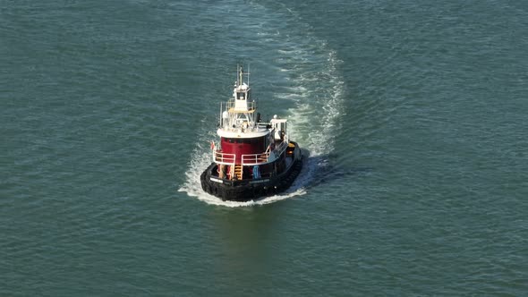 Aerial Telephoto 7x Zoom Tug Boat In Water