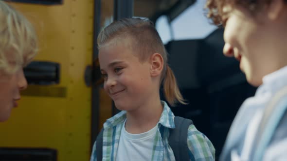 Three Teen Boys Standing at Bus Door Laughing Close Up