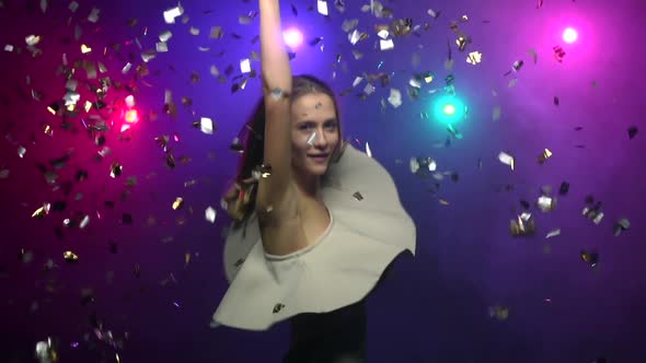 Close-up Girl Throws Glitter Confetti and Dancing, Slow Motion