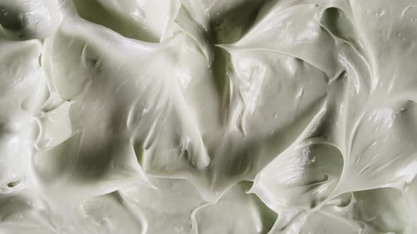 Macro Shot of Cosmetics Cream with Rotation