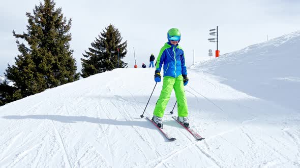 Preteen Boy Happy Learn How to Ski on Mountain Track