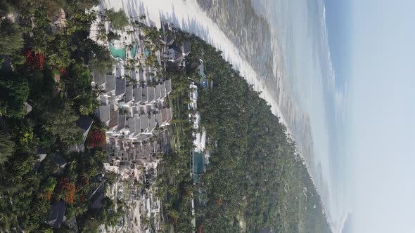 Vertical Video of Low Tide in the Ocean Near the Coast of Zanzibar Tanzania Aerial View