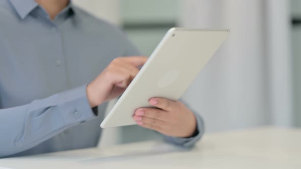 Close Up of African Woman Using Digital Tablet