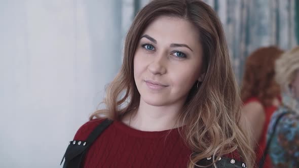 Portrait of a Young Beautiful Girl Dressed in a Leather Accessory, Close-up