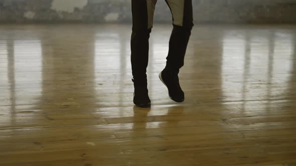 Boxer Skipping the Rope in an Empty Hall Listen Music in Headphones in Slow Motion