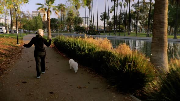 Senior Woman Working Out In The Park