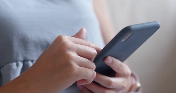 Woman Use of Mobile Phone at Home