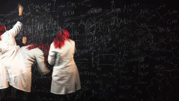Looped Time Lapse of a Female Student Writing Chemistry Formulas and Drawing Graphics on Blackboard