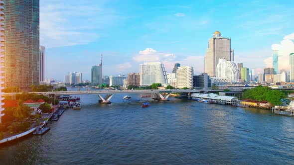 4K UHD : Bangkok River drone view. Flying over the Chao Phraya River