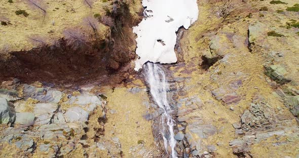 Aerial Flight Overhead Over Waterfall Creek in Yellow Mountain Valley Fall Establisher