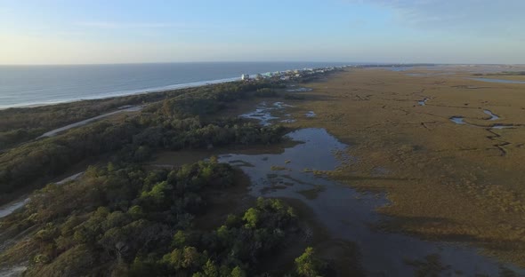 Aerial of Coastal Marsh and Forest on Folly Beach
