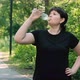 Young Plussize Woman Plays Sports in the Park and Drinks Water - VideoHive Item for Sale