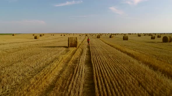 Girl and Hay Bales