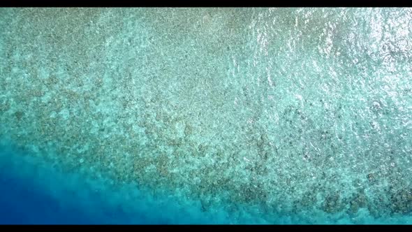 Aerial above tourism of luxury tourist beach holiday by blue ocean and white sand background of a da