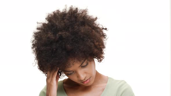 Upset Young Beautiful African Girl Over White Background