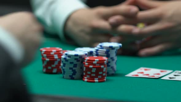 Poker Player Betting Money and Apartment, Goes All-In, Risk Addiction Concept