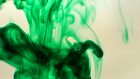 Smokey green ink drop in water LOOPING